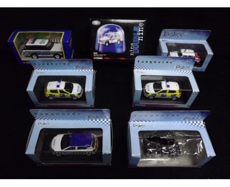 7 x Police Die-Cast Vehicles. 6 x Corgi = Model CC07702 Land Rover 110 Staion Wagon Thames Valley(sealed), 57602 Range Rover 