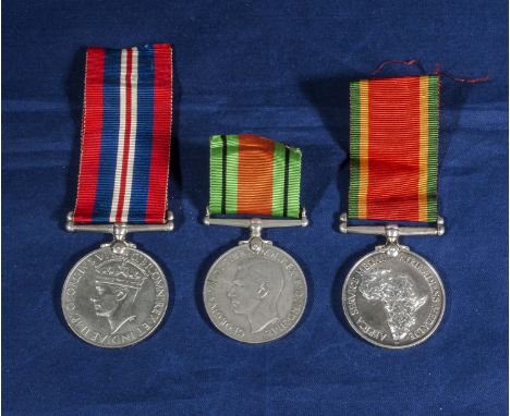  A trio of WW11 medals, Africa service and defence of war. R. Venn