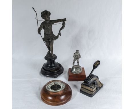 A spelter figure, small barometer, stamp and one other 