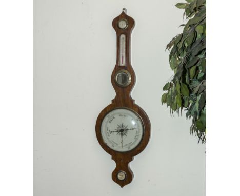A walnut onion top barometer 