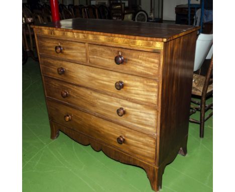 A late Georgian early Victorian mahogany chest of two over three drawers on splayed bracket feet