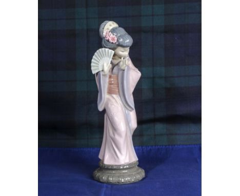 A Lladro figure No. 4990 Timid Japanese with original box 