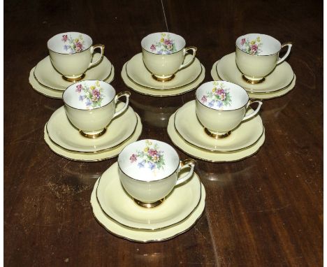 Six teacups, saucers and side plates, Queen Anne bone china 