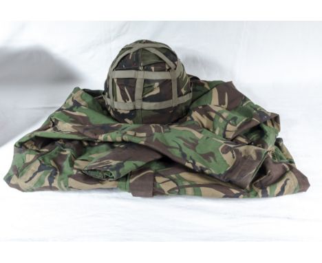  A waterproof camouflage jacket together with a camouflage helmet