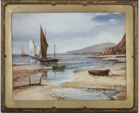 A small framed print of a coastal scene 