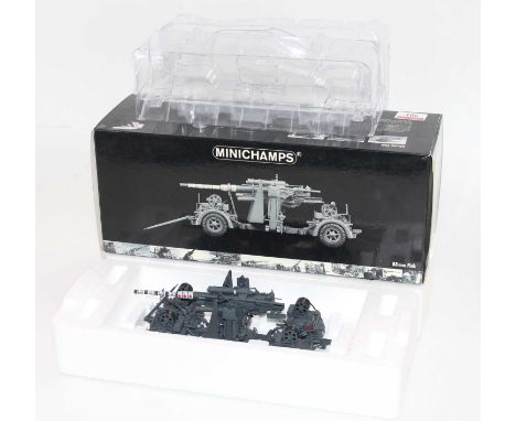 Minichamps Model No. 011080 1/35 scale model of an 88mm flak cannon on trailer, appears as issued in the original polystyrene