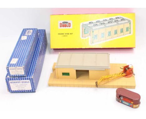 Three Hornby Dublo items: 5005 2-road Engine shed, complete, has been previously assembled (E-BE); 3-rail TPO lineside appara