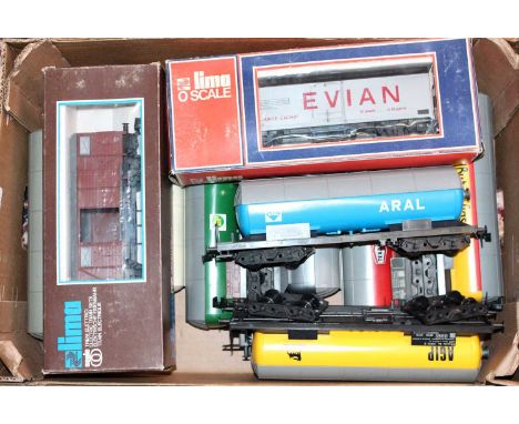 Lima Continental wagons: 8 bogie tanks – Shell, Mobil, BP, Esso, Texaco, Butane Gas, AGIP, ARAL; with Evian van &amp; brown v