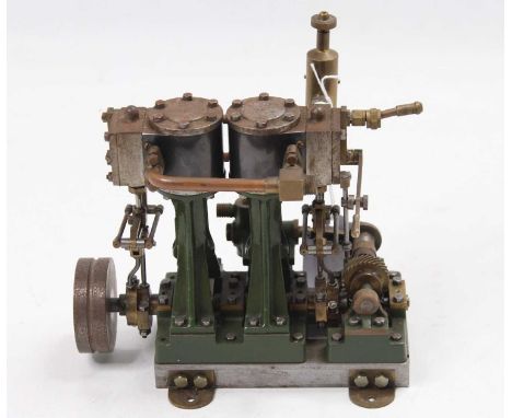 A Stuart Turner D10 stationary marine engine, comprising of twin cylinders suspending on A frames, with slip eccentric and sl
