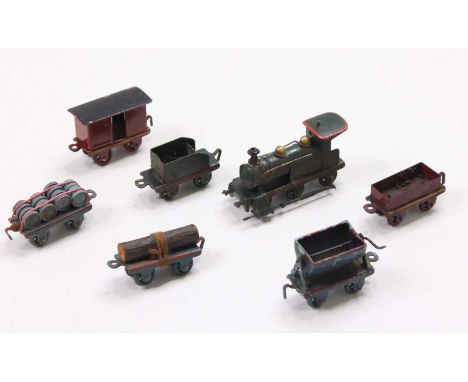 Early 20th-century miniature metal and diecast train set, comprising 0-6-0 Steam locomotive and tender, hopper wagon, lumber 