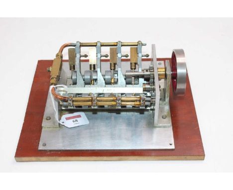 A very well made model of a V8 Stationary Engine, housed on a wooden plinth, free-running example, constructed from various m