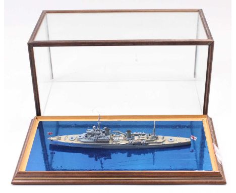 A well made scale model of HMS 'Newfoundland' constructed in metal with full detail, presented in a glass display case with w