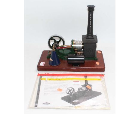 Reeves Heritage Collection Stirling Cycle Engine titled "Fury", comprising of a single-cylinder engine, spoked flywheel with 