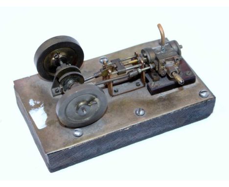 A scratch-built single stationary horizontal steam engine, hand made from brass and gun metal components, comprising of cast 