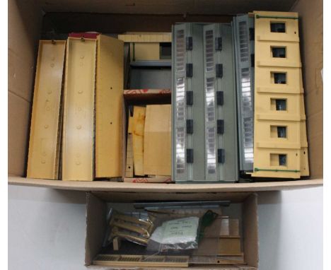 Large box containing parts for Hornby Dublo plastic buildings. None guaranteed complete and many doors and windows missing. P