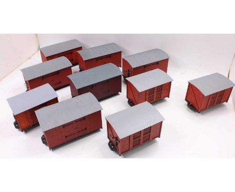 10 various 32mm scale balsawood kit-built box vans, comprising brown bodies with grey roofs, possibly Indian or Darjeeling Ra