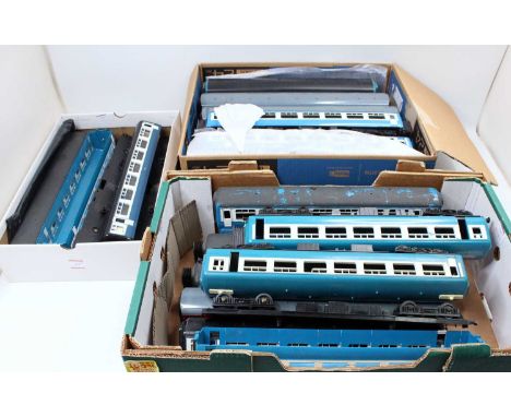 Two large trays containing 18 plastic 0 gauge bogie coaches mostly Big-Big with a couple of Lima. None in original condition 
