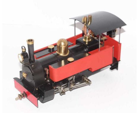 32mm scale gas-powered model of an 0-6-0 live steam locomotive, finished in burnt orange, executed to a high standard, use ex