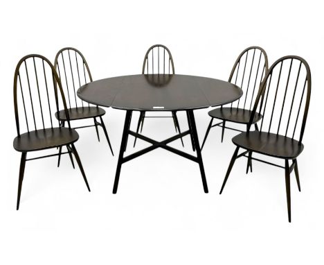 Lucian Ercolani for Ercol - dark elm and beech drop leaf dining table, oval top with two drop leaves, raised on splayed suppo
