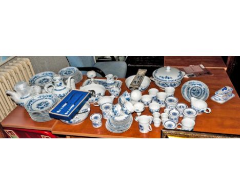 Large German Porcelain Blue Dinner Set 'The Onion Pattern' including tureens, bowls, sandwich tray, oval platters, sauce boat