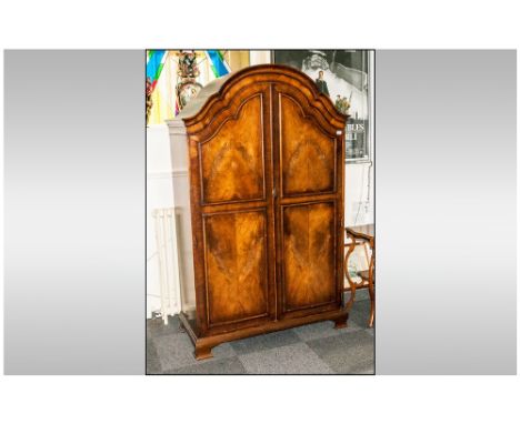 A Burr Walnut Queen Anne Style Double Door Panel Door Front Wardrobe, with a Shaped Canopy Top and Fitted Interior with Slidi