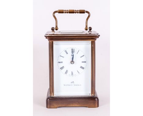Mathew Norman Fine Quality Brass Carriage Clock 8 Day Movement, White Dial & Black Numerals. Visible  escapement. Glass Panel