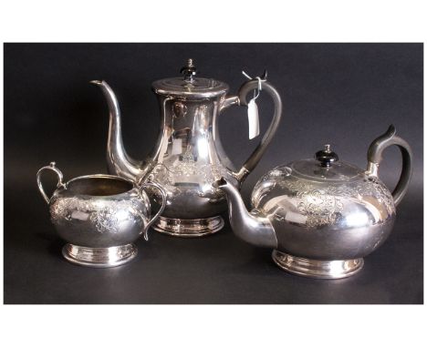 Three Piece EPNS Plated Tea Service, with engraving to the body. Melon Shaped with ebony handles.