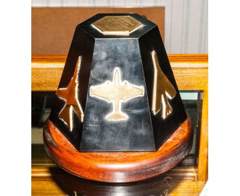 ''BAE'' 1989 Presentation Obelisk, Black Cast Metal Hexagonal Tapering Form, Each Side With Applied Brass Profiles Of Six Fig