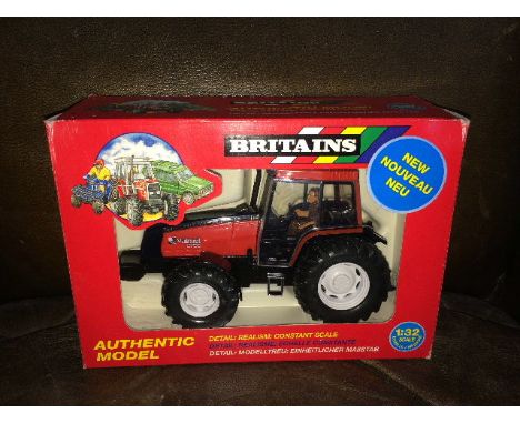 BRITAINS - VALTRA VALMET 8750 RED/ORANGE (9439) 1:32 SCALE