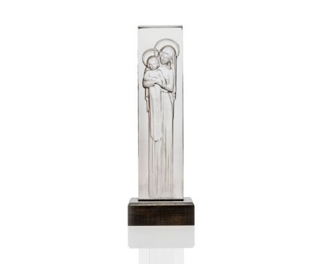 RENÉ LALIQUE (FRENCH 1860-1945) VIERGE À L’ENFANT PANEL, NO. 1217 designed 1934 clear and frosted, in stained wood base stenc