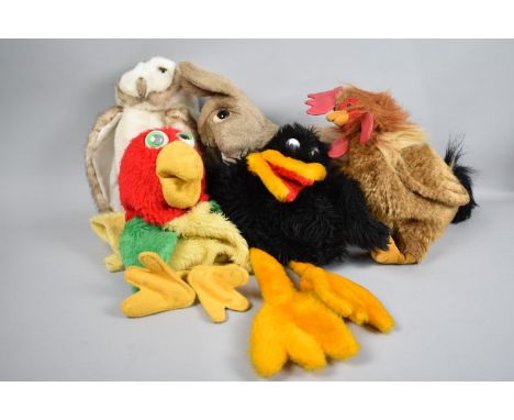 A Collection of Various American Plush Hand Puppets, Cottontail Rabbits, Barn Owl and Rooster by Folkmanis together with Crow