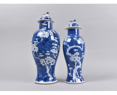 A Chinese Late Qing Dynasty Porcelain Blue and White Prunus Pattern Baluster Vase and Cover with Character Mark for Kangxi to