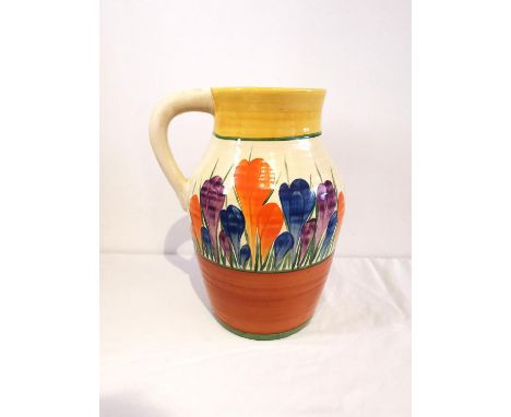 Clarice Cliff - Crocus - A single handled Lotus jug circa 1930, hand painted with Crocus sprays between yellow, green and ora