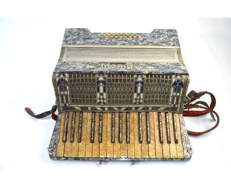 A German Stanelli piano accordion with marbled body and 25 buttons, with case