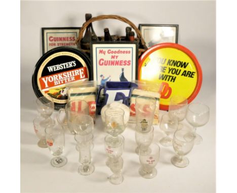 A collection of brewery related items, to include Guinness prints, tea towel, Worthington E water jug, Yorkshire Bitter/DD ad