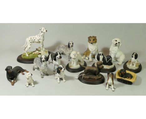 A collection of handcrafted model dogs together with ceramic fruit bowls, glass vases, an early twin spirit brass &amp; coppe