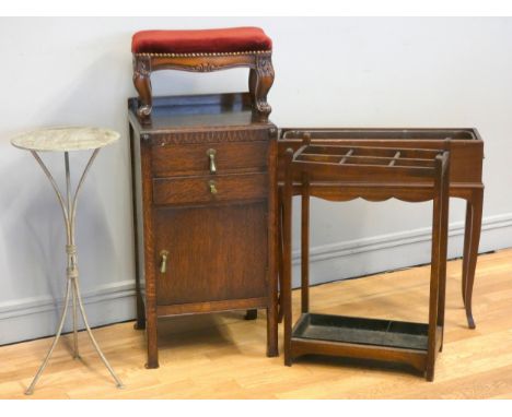 An Edwardian pot cupboard, two drawers over a lower hinged door, 75cm, together with a sewing cabinet, a stick stand, jardini