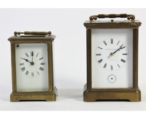 A Matthew Norman alarm and repeating brass carriage  clock, striking on two gongs, A/F, 13cm together with an unmarked brass 