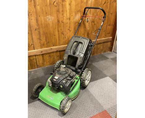 A Florabest petrol driven lawn mower, with Briggs &amp; Stratton series 575EX 140cc engine. 