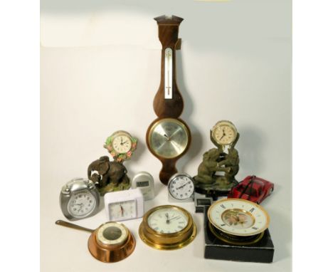 A collection of novelty clocks to include, Wallace &amp; Gromit alarm clocks, car clocks, a decorative egg clock and others 