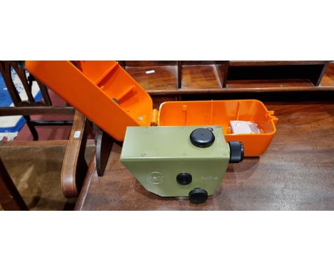 Two surveyors measurers together with a Kern Swiss GKO-A surveyor leveller 