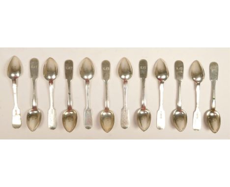 A Russian set of twelve fiddle pattern tea spoons, Various assay masters and silversmiths but all Riga 1888-1899 (not 1892), 