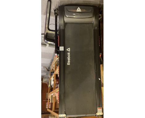 A Reebok One GT40s treadmill with attachments, power lead and manual, together with a Smart Wonder Core ab trainer (2) 