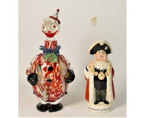 A Murano glass figural decanter in the form of a clown, together with a Beswick figural water jug advertising Worthington's p