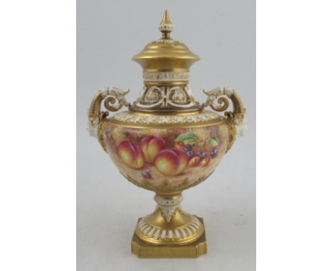 A Royal Worcester pedestal covered vase, decorated all round with fruit to a mossy background by Freeman, shape number 1572, 