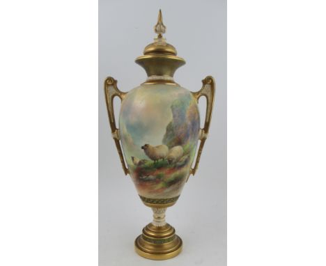 A Royal Worcester covered pedestal vase, decorated with sheep in landscape by H Davis, shape number 1481, height 19ins