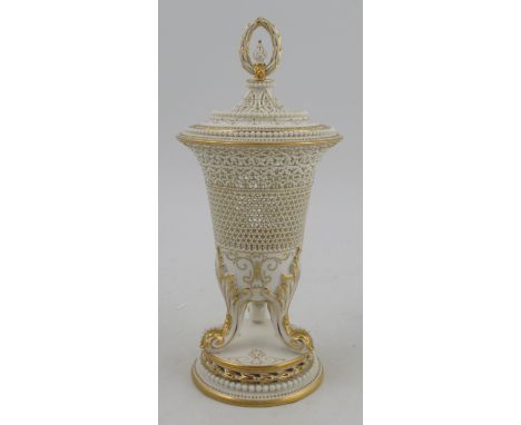 A Royal Worcester covered pierced vase, by George Owen, with gilt decoration, shape number 2519, height 10ins