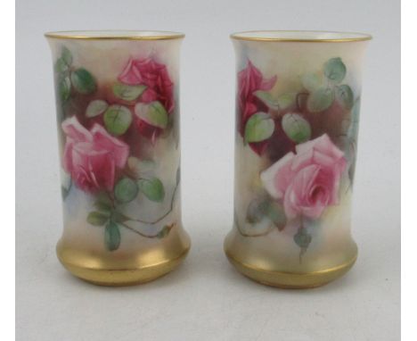 A pair of Royal Worcester cylindrical vases, decorated with roses, shape number 2510, height 4.5insCondition Report:  No obvi