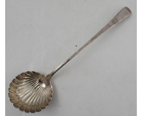 A Georgian silver feather edge pattern soup ladle, having a shell bowl, London 1776, maker Hester Bateman, 13.5ins long, weig