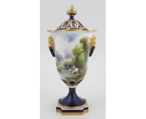 A Royal Worcester covered pedestal vase, with pierced cover, the body decorated to the front with a landscape by H Davis, sha